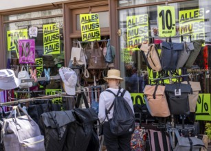 Retail trade with signs for price reductions and discounts, Potsdam, Brandenburg, Germany