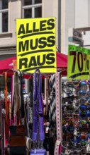 Retail trade with signs for price reductions and discounts, Potsdam, Brandenburg, Germany