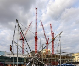 Play scaffolding with jump ropes, construction cranes at Alexanderplatz, Berlin, Germany