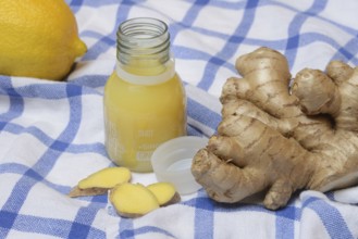 Ginger root, lemon and ginger shot