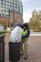 Washington, DC USA - 27 November 2025 - On Thanksgiving Day, a Hispanic worker is on the job