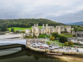 Conwy Castle over River Convy from a drone, Convy, North Wales, England, United Kingdom