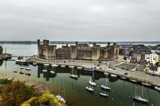Caernarfon Castle from a drone, Caernarfon, Gwynedd, North-West Wales, UK