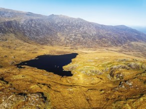 Autumn colours over Llyn Cwmffynnon and Miner's Track, Start Point, road A4086 from a drone,
