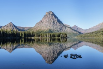 240906_006 Reflection of Sinopah Mountain on Two Medicine Lake at the Two Medicine Ranger Station