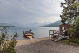 240903_044 Rental boats on a floating dock along the Lake McDonald shoreline at Apgar Village in