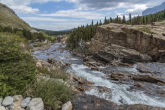 180828_025 Swiftcurrent Creek flowing through rocky terrain in the Many Glacier area of Glacier