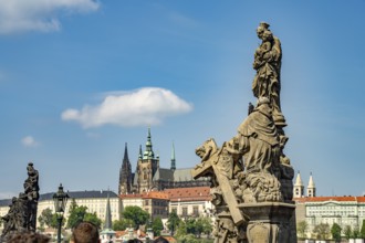 Statue of Madonna and Saint Bernard on Charles Bridge in front of Prague Castle, Prague, Czech