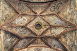 Coat of arms on the Gothic Old Town Bridge Tower in Prague, Czech Republic