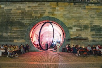 Bar Bike7 on the banks of the Vltava river in the evening in Prague, Czech Republic