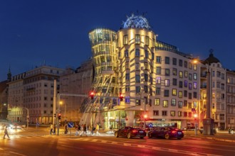 The Dancing House of architects Vlado Milunic and Frank Gehry at dusk, Prague, Czech Republic