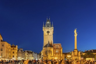Old Town Town Hall and St. Mary's Column on Old Town Square at dusk, Prague, Czech Republic