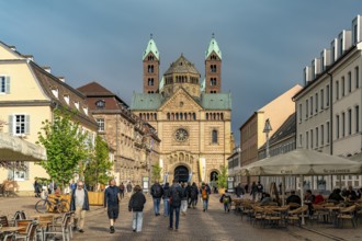 Cafes on Maximilianstraße and Speyer Cathedral in Speyer, Rhineland-Palatinate, Germany