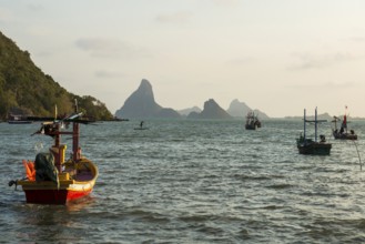 Bay with mountains and fishing boats, sunset, Prachuap Khiri Khan, Prachuap Khiri Khan Province,