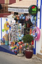 Souvenir shop in the town of Carvoeiro, Algarve, Portugal, A small shop with souvenirs, colorful