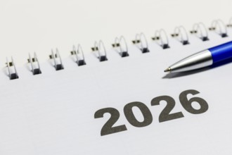 Ringbook calendar, calendar page for the year 2026 with a blue pencil on it