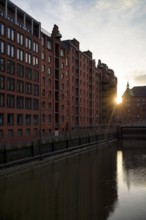 Warehouses, façade, brick building, Hamburger Speicherstadt, Hafencity, canal, sunset, evening