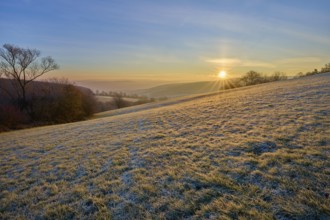 A sunny, frosty morning with a view of a hilly landscape, Seckmauern, Lützelbach, Maintal,