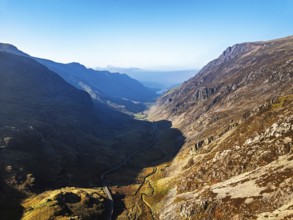 Autumn colours of Pen-y-Pass over Miner's Track, Start Point and road A4086 from a drone,