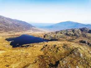 Autumn colours over Llyn Cwmffynnon and Miner's Track, Start Point, road A4086 from a drone,