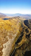 Autumn colours over Llyn Cwmffynnon and Miner's Track, Start Point, road A4086 from a drone,