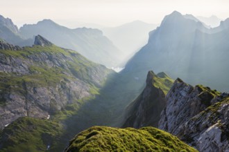 View over Alpstein Mountains into the Meglisalp Valley at sunrise, Rotstein Pass, Säntis,