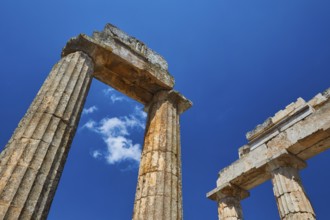 Ancient columns rising into the clear sky, Nemea, Ancient Zeus Church, Archaeological Site,