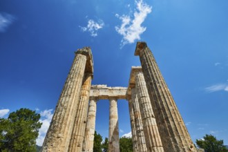Pillars of an ancient ruin against a blue sky, Nemea, Ancient Zeus Heightum, Archaeological Site,