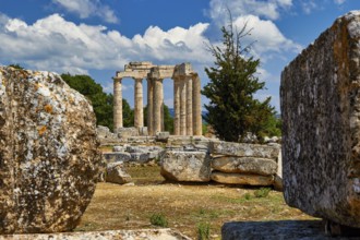 Ancient Greek ruins with columns under a blue sky with clouds, Nemea, Ancient Zeus Heightum,