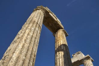 Close-up of an old pillar against a clear sky. Greek Ruins, Nemea, Ancient Zeus Heightum,