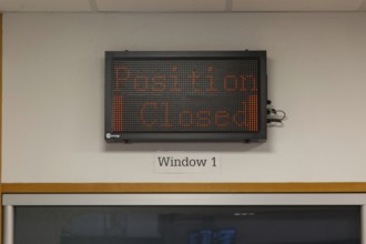 Position Closed sign at railway ticket office, Exeter St Davids railway station, Exeter, Devon,