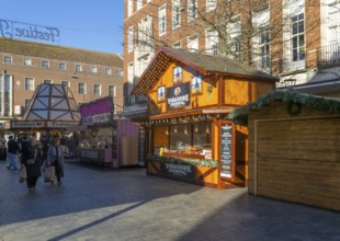 Christmas market wooden shed market stalls in city centre, Exeter, Devon, England, UK - Yorkshire