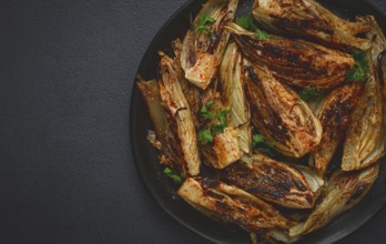 Baked, oven-baked fennel, with spices, in olive oil, homemade, no people