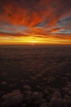 View from airplane window at sunrise