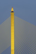 The illuminated Rama VIII Bridge, a cable-stayed bridge across Mae Nam Chao Praya, Bangkok,