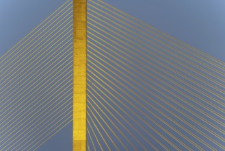 The illuminated Rama VIII Bridge, a cable-stayed bridge across Mae Nam Chao Praya, Bangkok,