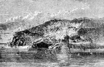 Small village with reed huts on Lake Tanganyika, lake shore, mountain landscape, rocks, wooden