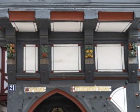 Decoration on half-timbered house, former press house, market, Oberstadt, Marburg, Hesse, Germany