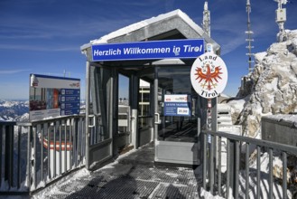Border crossing to Austria at the mountain station of the Zugspitze cable car (2962 m), German