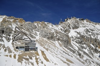 View of the Schneefernerhaus and the mountain station of the Zugspitz cable car (2962 m),