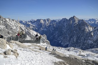Tourists on a viewing platform on Zugspitzplatt, Grainau municipality, Garmisch-Partenkirchen