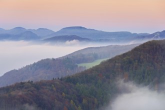 View from the Gisliflue of the Jura foothills covered in fog, in the light of dawn, Talheim,