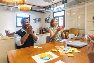 Diverse colleagues participating in a successful meeting, collaborating and brainstorming ideas