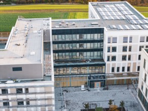 Detailed view of an office building with modern windows and solar panels, new hospital, Calw Health