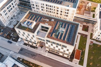 Detail of a green roof with solar panels on a modern building, new hospital, Calw Health Campus,