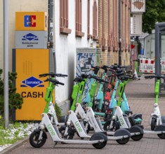 Electric scooters and rental bikes on public roads, Berlin, Germany