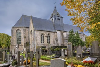 12th century Church of Our Lady, Onze-Lieve-Vrouwekerk in the village Wulveringem in autumn, fall,