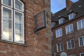 Nose sign from Hotel Anno 1216, historic brick building from the 13th century, Hanseatic City of