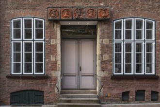Terracotta decoration above the entrance to the Schabbelhaus, a Renaissance building built in 1558,