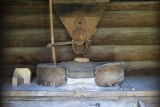 Millstone for making flour, Bjørnstad, farm from Vågå, Maihaugen open-air museum with houses and